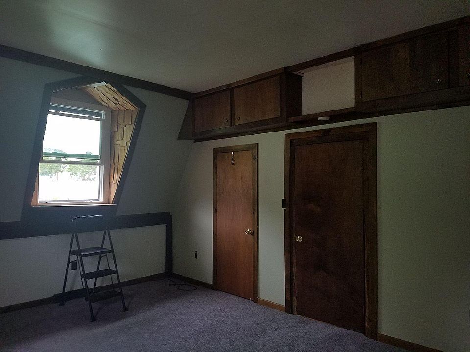 Bedroom with entry to bathroom.
