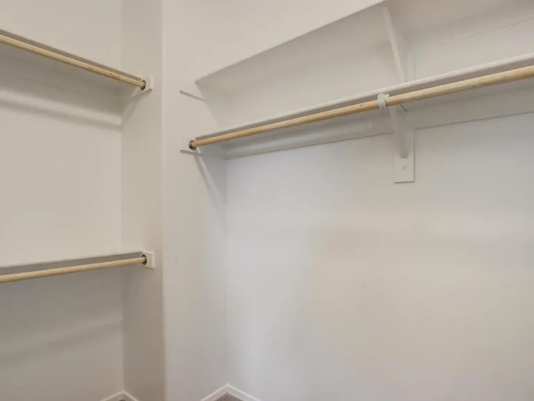Primary suite walk-in closet