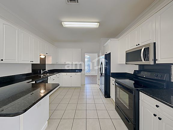 3rd image of 9664 Woodland Creek Ln
