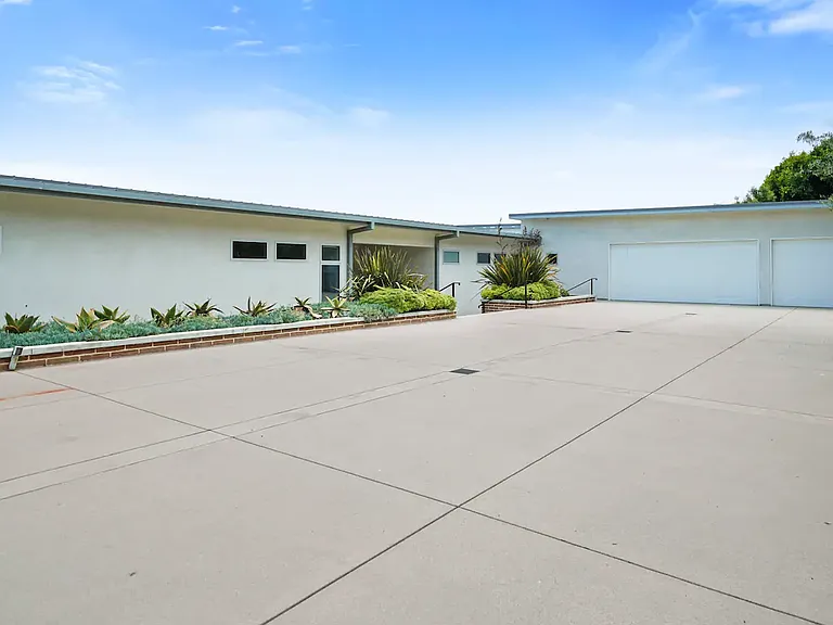 Includes a private driveway providing convenient and secure parking.
