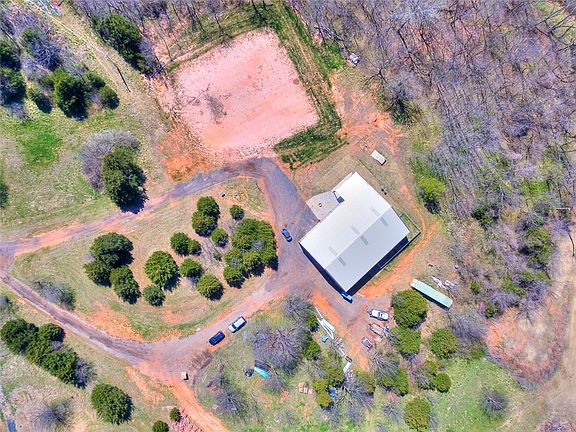 Well maintained 54 acre property with asphalt roads is ready for your dream home.