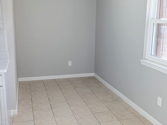 Big and Spacious dining room, next to the kitchen area; can be used as a work from home office space. Get a lot of sunlight and stays bright and lit.