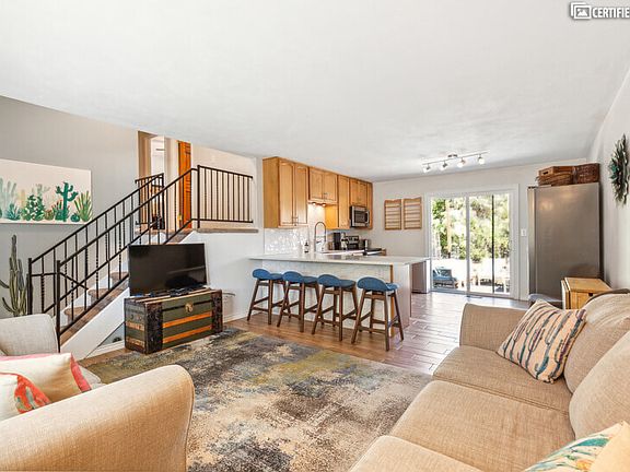 Living room, kitchen, stairs, open floorplan