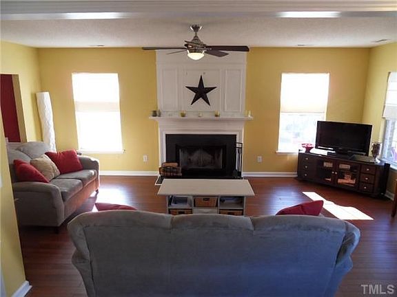 Living Room with Wood-Burning Fireplace
