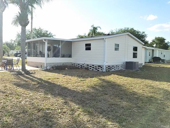 back with screened lanai & patio