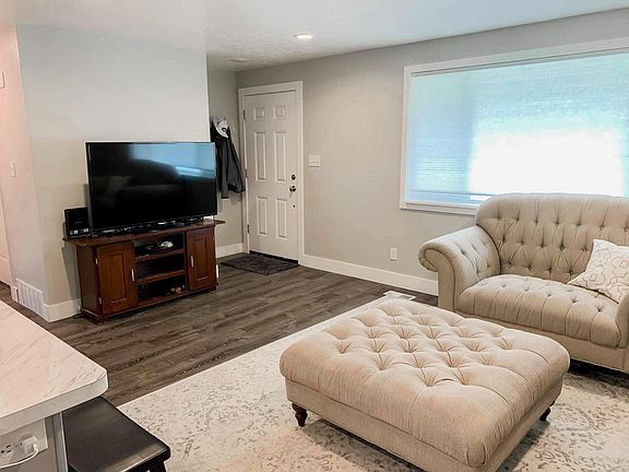 This shows the room when you walk in from the front door. This room can be used as a sitting/dining room or a living room.