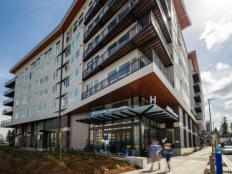 z-060326-Heron Flats & Lofts — Photo 1