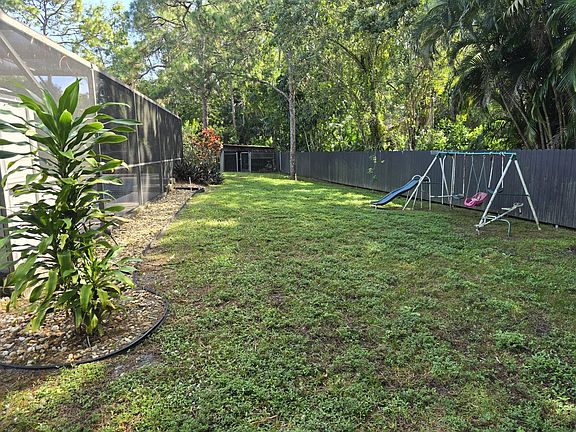 Playground swing set on property for all the kids fun