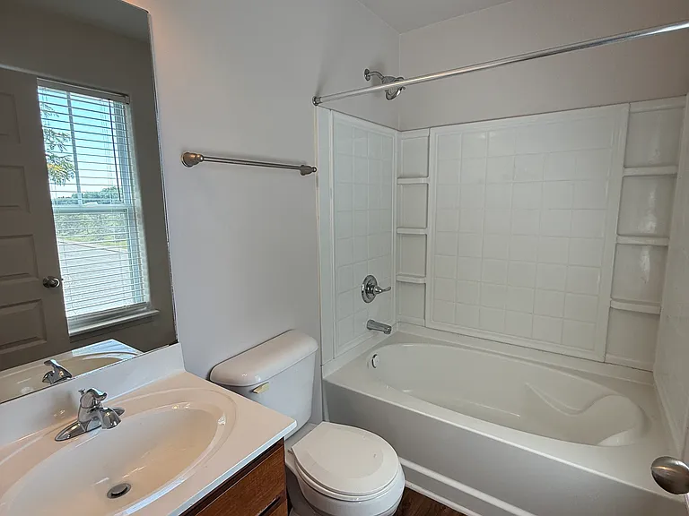 Photos of layout in similar unit. Overall finishes and fixtures may vary by home