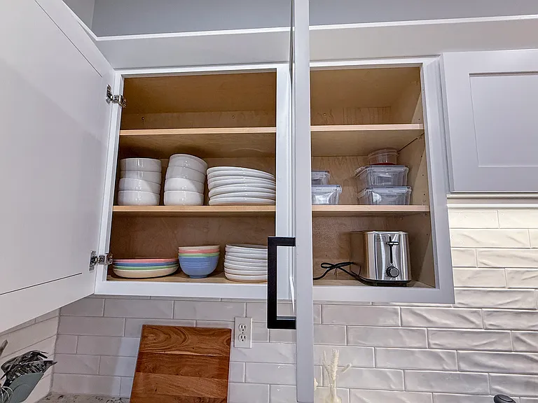 Kitchen is fully stocked to prepare and eat meals