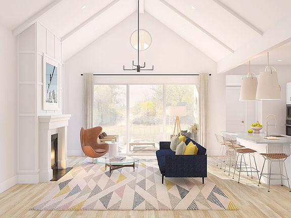 Great room with shiplap and white-stained ceiling beams