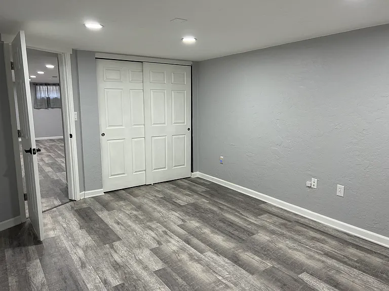 Downstairs bedroom (egress window has been constructed since this photo)