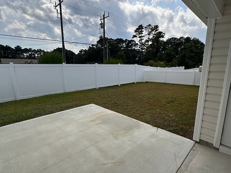 Fully fenced in back yard