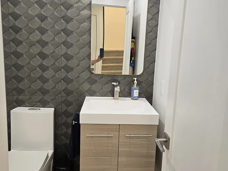Powder room. Custom tile. Sound proofing.