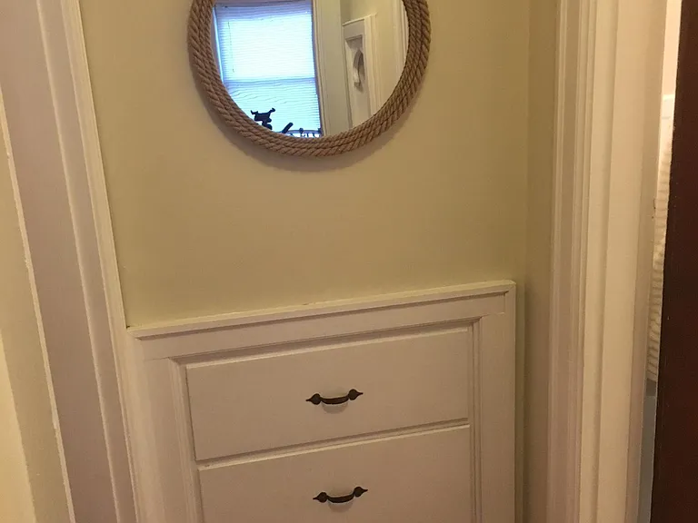Hallway with built in Linen storage.