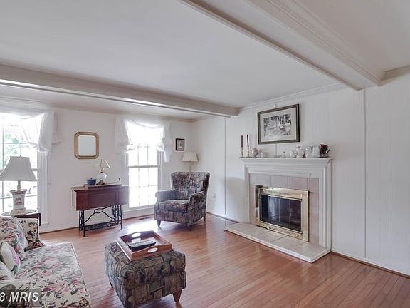 Family Room w/ converted gas fireplace