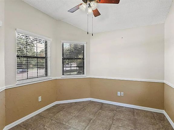 Breakfast area with three street view windows
