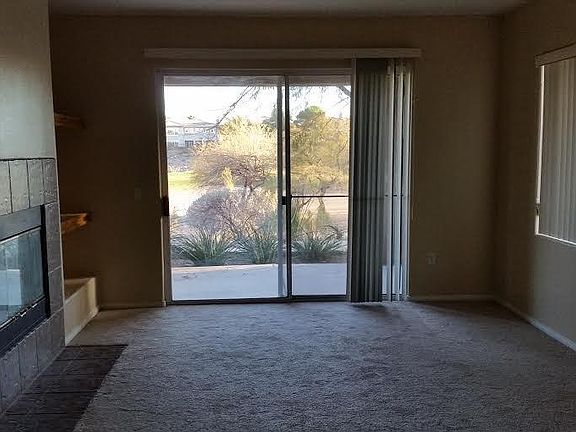 ENTRY AND KITHCHEN VIEW OF GOLF COURSE