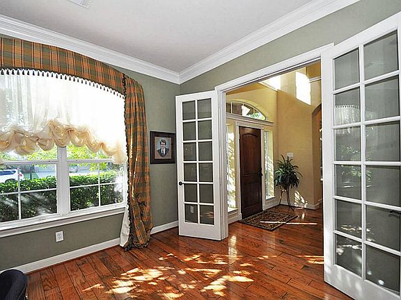 Study also features hardwood floors beautiful views to the mature landscaping out the front windows.