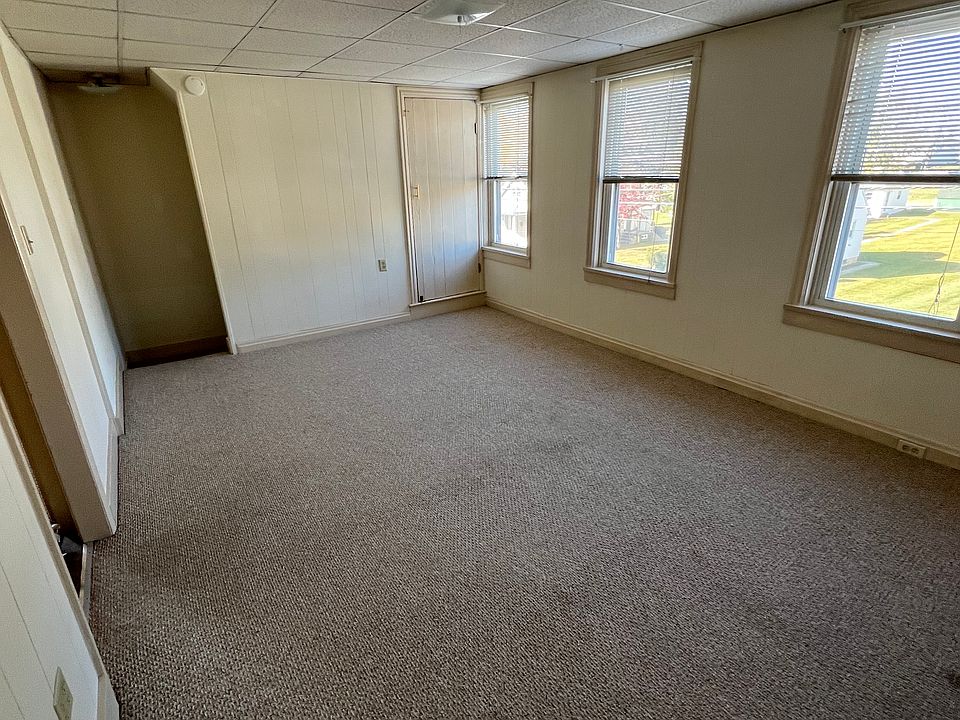 Large living room with ample natural light.
