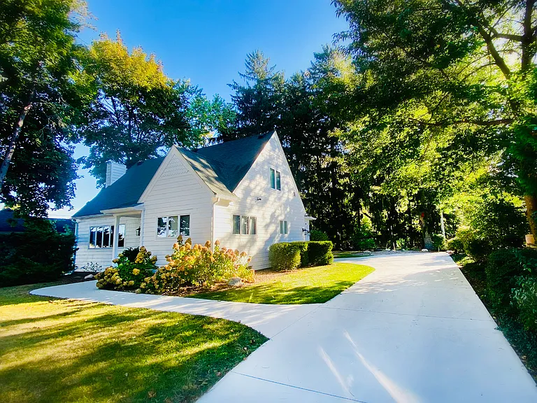 View of property from road. Quiet peaceful setting. Large driveway up from road. Safe neighborhood and gorgeous setting.