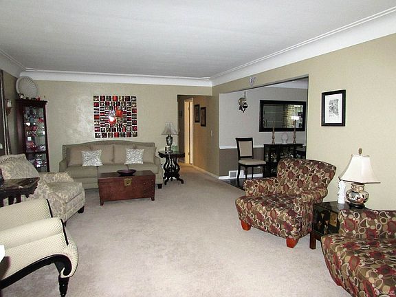 Living Room: Large living room with cove ceilings