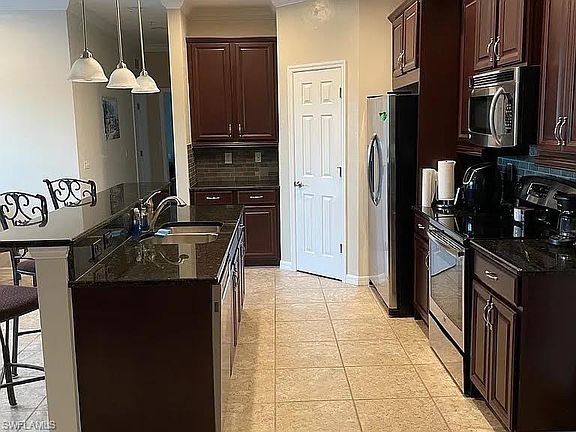 2nd image of 8570 Evernia Ct Unit 203