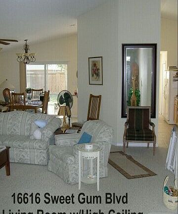 living room has cathedral ceiling