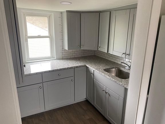 Kitchen with new cabinets and granite counters