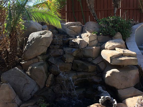 Rock waterfall w/ Koi Pond