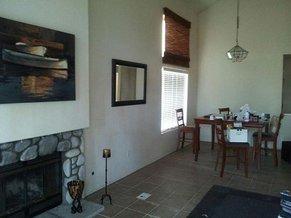 Tile floor, carpet upstairs