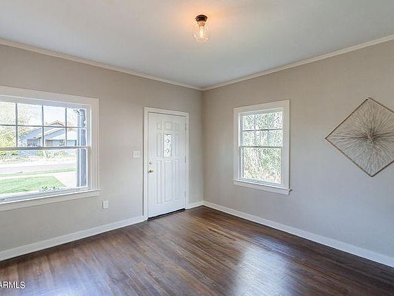 Front /Living Room - large historic windows bring a lot of natural light