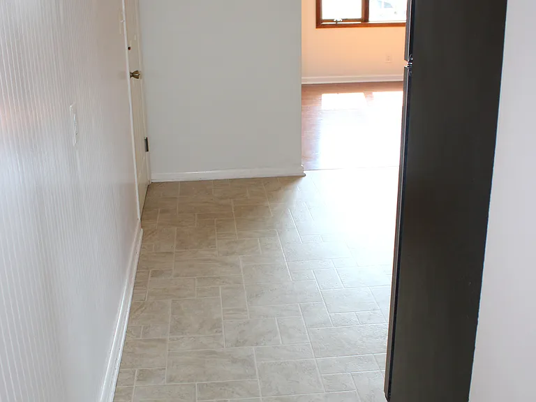 Hallway Leading From Bedrooms/Bathroom to Kitchen