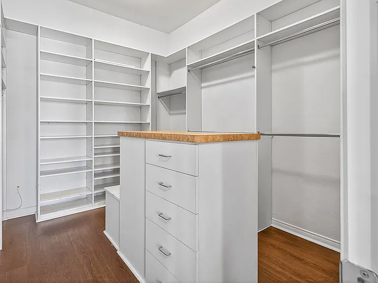 PRIMARY BEDROOM SUITE HAS WALK IN CLOSET