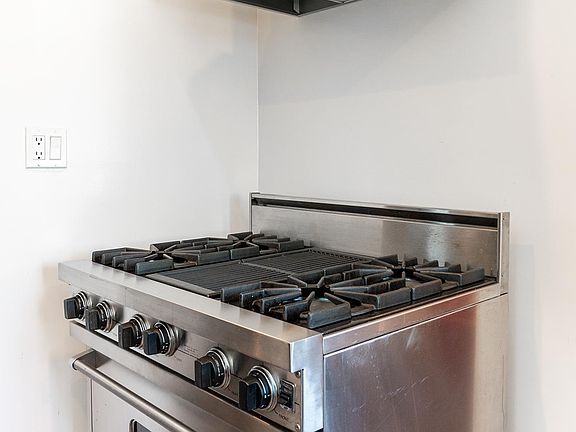 Viking Stove with exhaust hood and light