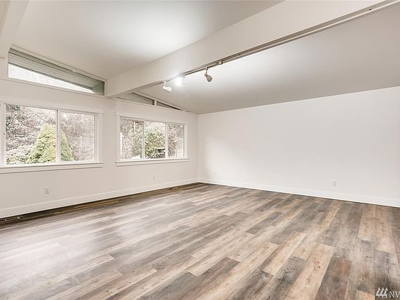Wonderful living room with vaulted ceilings and extra windows.  This is your main floor living space!