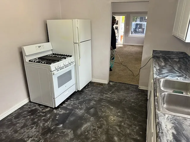1000 S Denver St — Photo 4