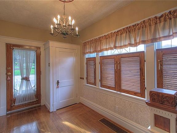 Entry.   Inviting. Warm. Architectural details