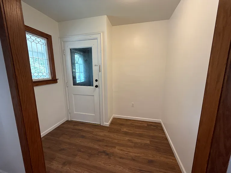 Foyer leading to front door