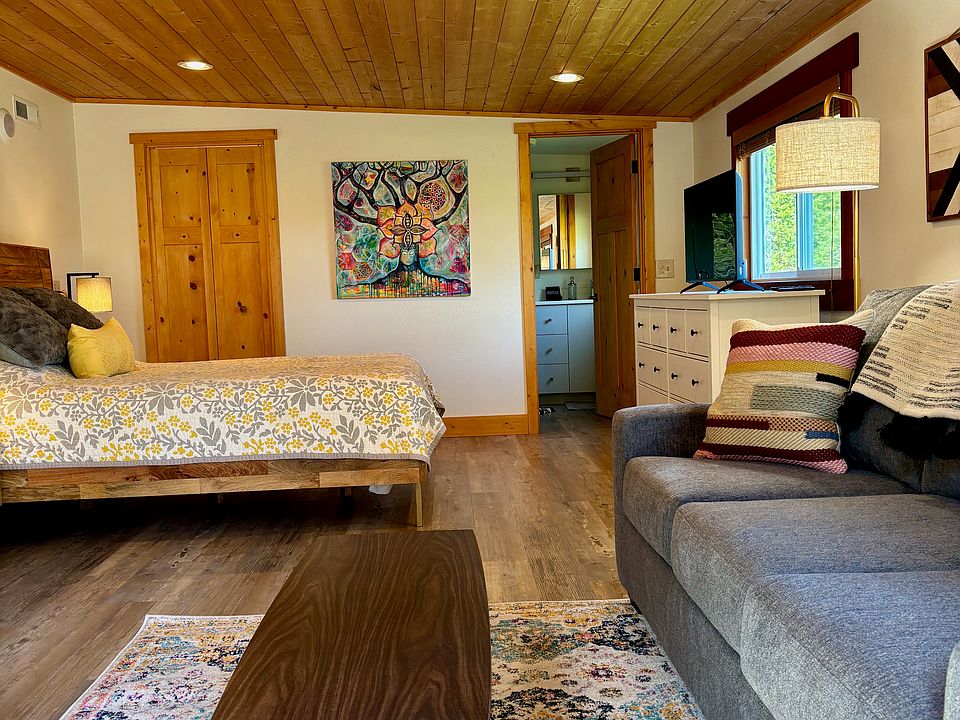 Studio with queen size bed and queen size sofa sleeper.