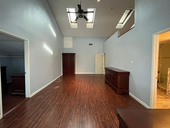 Master bedroom with walk-in closet and bathroom
