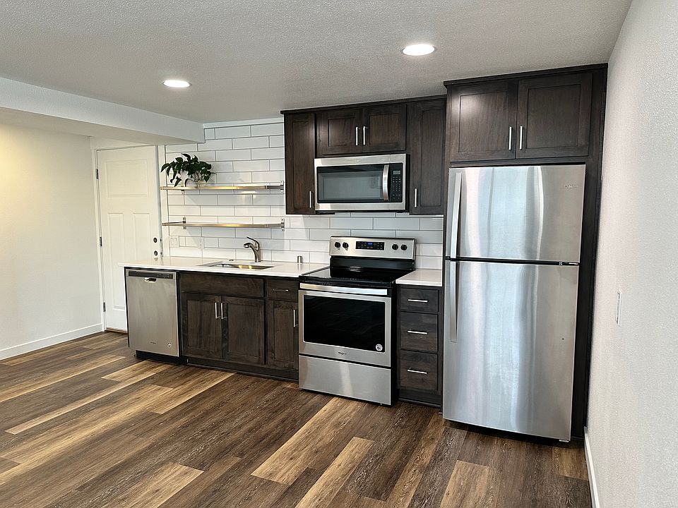 Full kitchen with stainless steel appliances