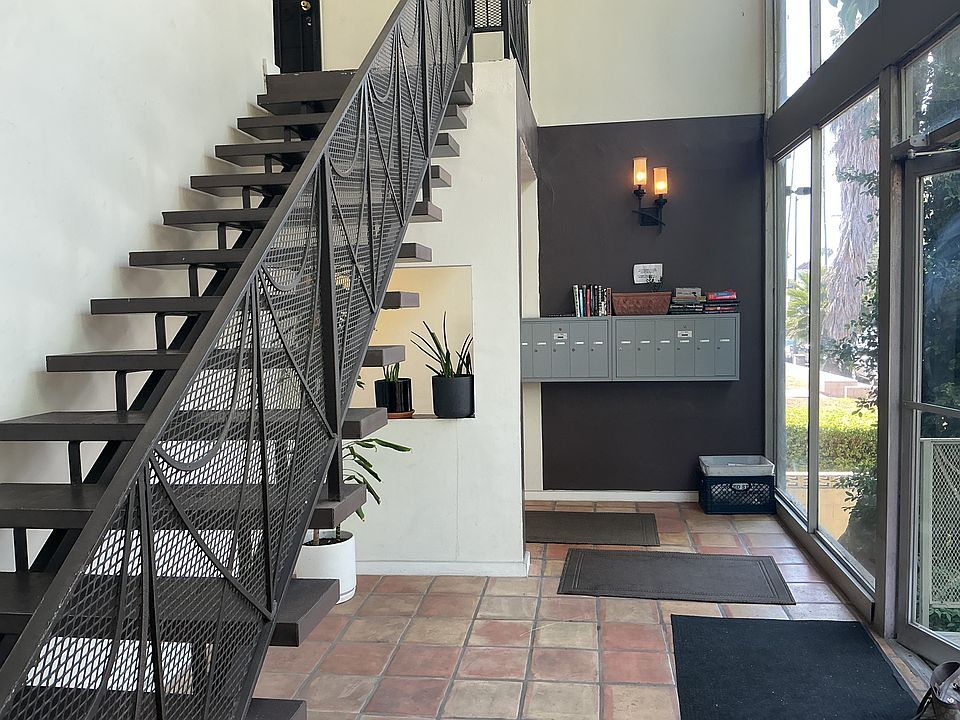 Main lobby, mailboxes and stairs to second floor, where the unit is located
