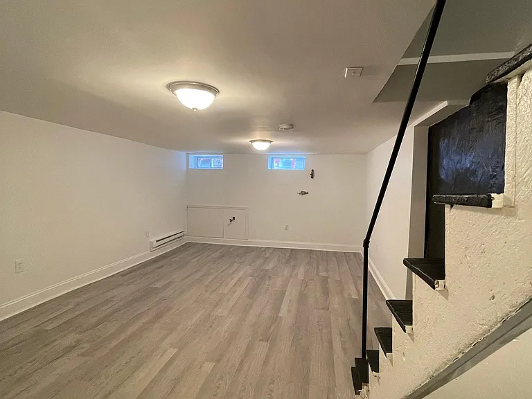 spacious basement room which can serve as a 2nd bedroom or as a 2nd living room