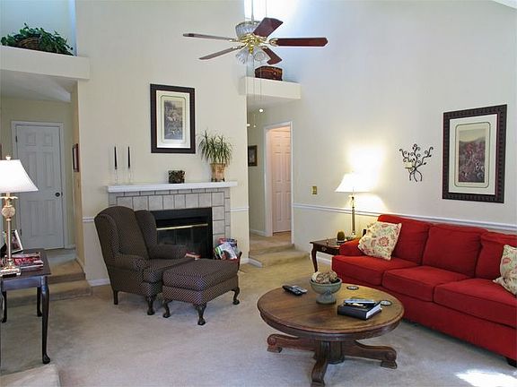 Gorgeous, dramatic fireplace soars to the ceiling.