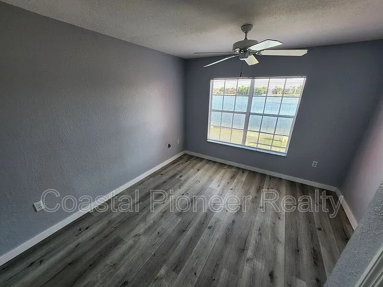 9232 Lake Chase Island Way — Photo 25