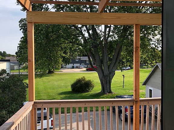 Back porch with pergola and outlet for porch lights