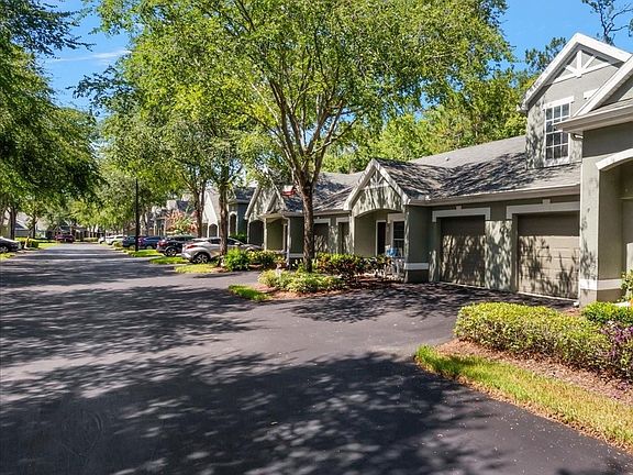 Villa-style condo with private garage in gated Waterford community