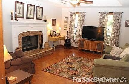 Sunken living room w Fireplace