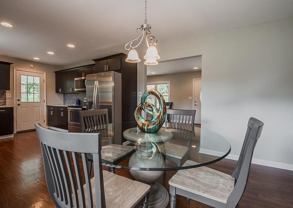 Combo dining, kitchen and view into living room from this spot.